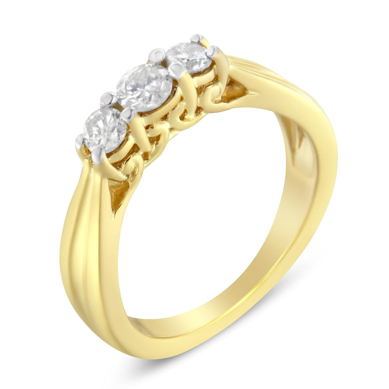 10K Yellow Gold Three-stone Diamond Ring (0.50 cttw, J-K Color, I2-I3 Clarity) 10K yellow gold ring with 3 round diamond stones in a low three-stone setting