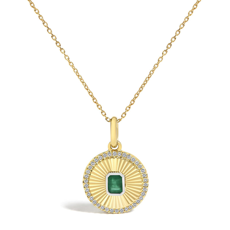 10K Yellow Gold 4x3 MM Emerald and 1/10 Cttw Diamond Circle Fluted Medallion Pendant Necklace 10K Yellow Gold 4x3 MM Emerald and 1/10 Cttw Diamond Circle Fluted Medallion Pendant Necklace-0