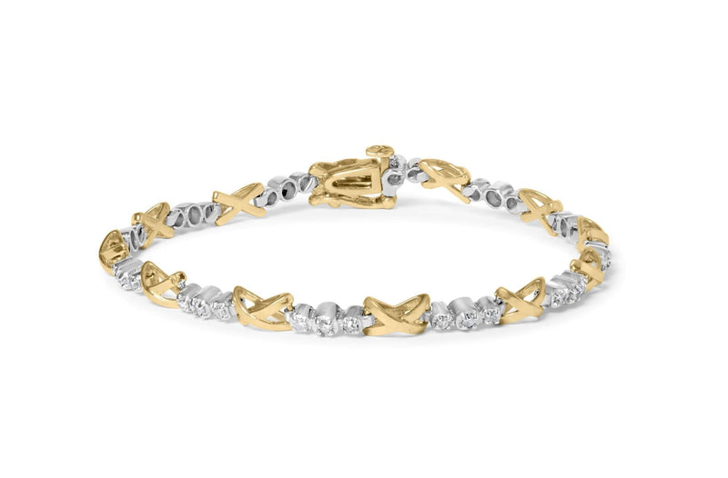 10K Two-Tone Gold 1/2 Cttw Diamond Alternating 3 Stone and X-Link 7 10K two-tone gold bracelet with 3 round diamond stones in X-link design