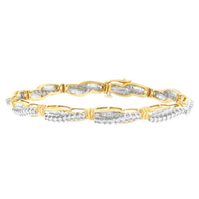 14K Yellow Gold Round and Baguette Cut Winding Love Diamond Bracelet (3.00 cttw, H-I Color, SI1-SI2 Clarity) 14K yellow gold bracelet with round and baguette diamond stones