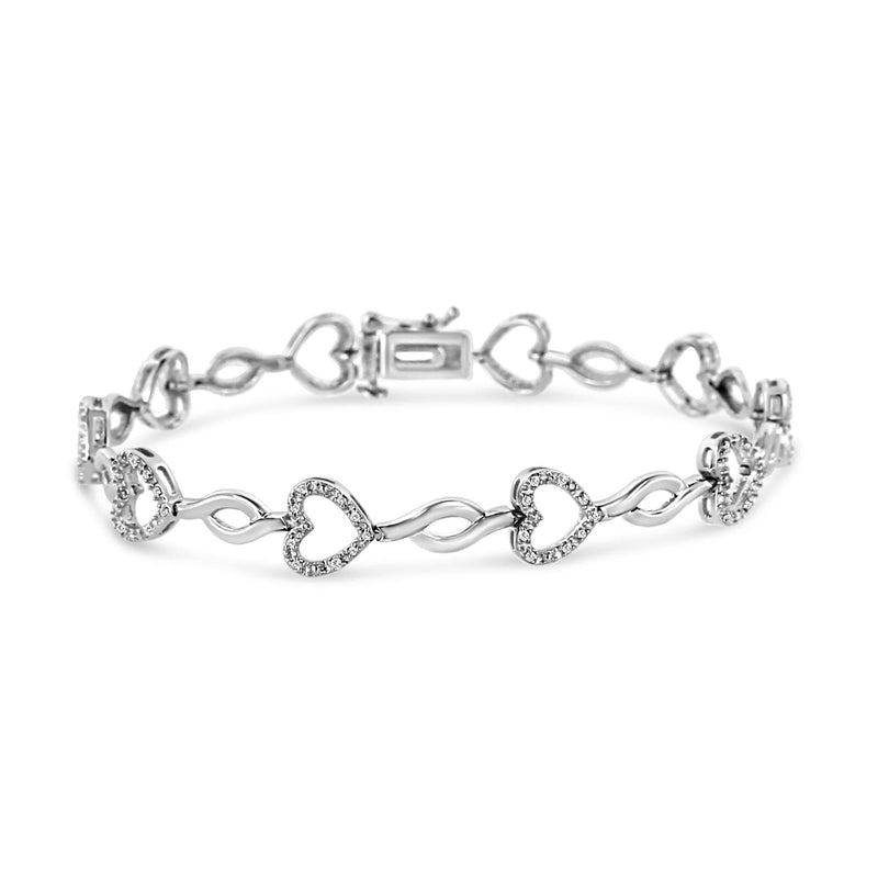 .925 Sterling Silver 1/4 Cttw Round-Cut Diamond Alternating Heart and Leaf Link Bracelet (I-J Color, I3 Clarity) - Size 7.25 925 sterling silver heart and leaf link bracelet with round diamond stones