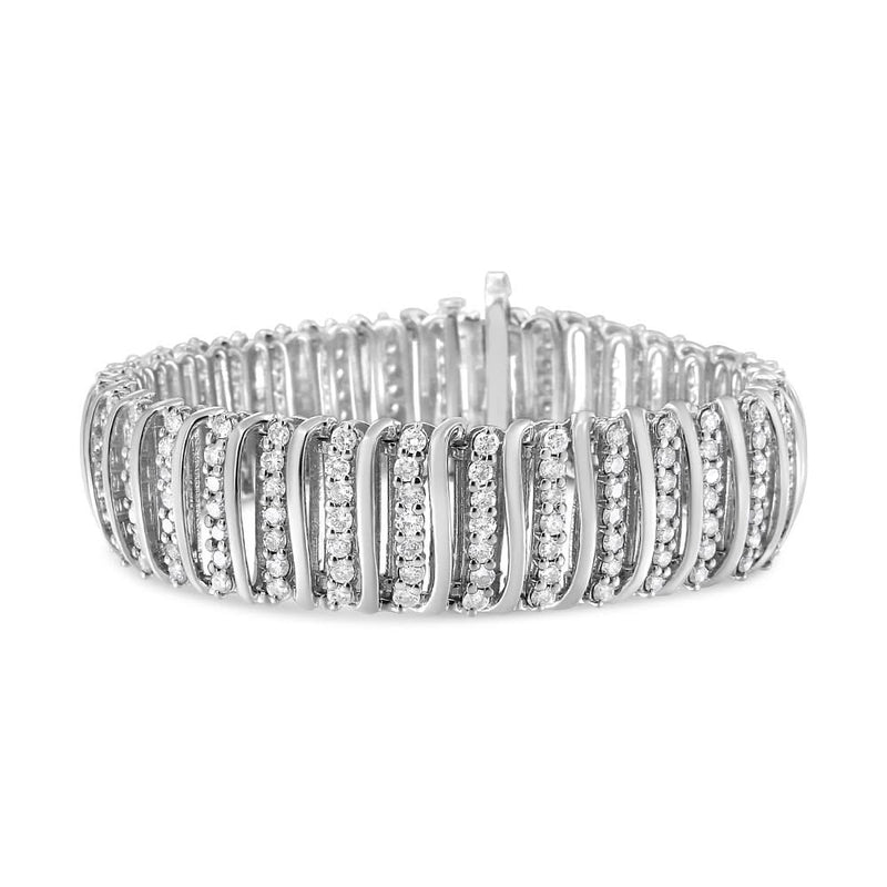 .925 Sterling Silver 8 1/2 Cttw Diamond 7 Row Chevron 925 sterling silver tennis bracelet with 7 rows of chevron diamond links