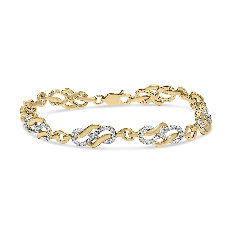 14K Yellow Gold Plated .925 Sterling Silver 1.0 Cttw Diamond Infinity Loop and Swirl Link Bracelet 14K yellow gold bracelet with 1.0 ctw diamonds on infinity loop and swirl links