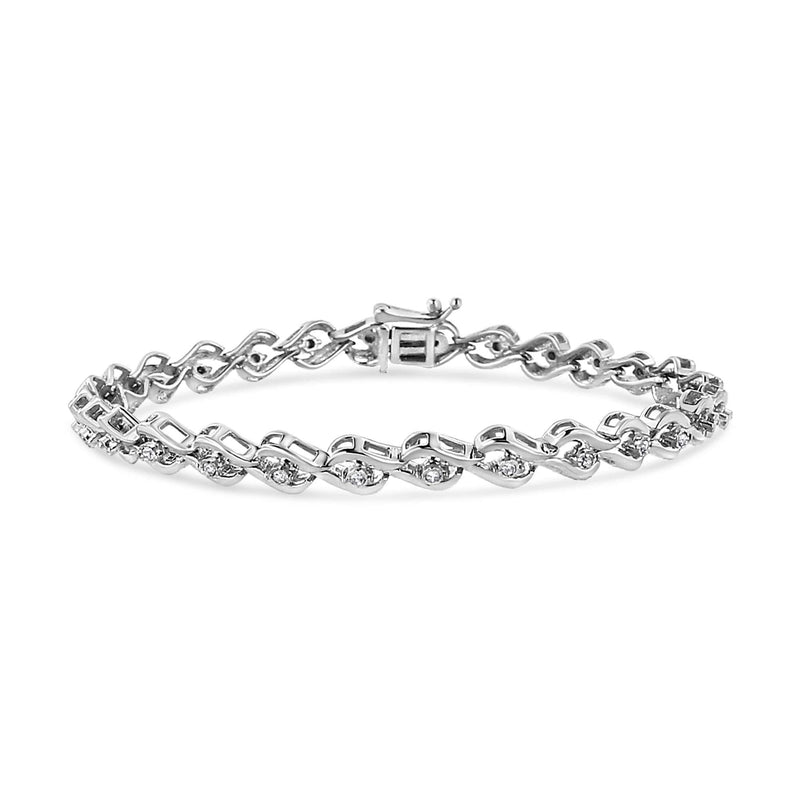 .925 Sterling Silver 1/10 Cttw Round-Cut Diamond Links of Flame Bracelet (I-J Color, I3) - 7.25 925 sterling silver bracelet with round diamond stones in a flame link pattern