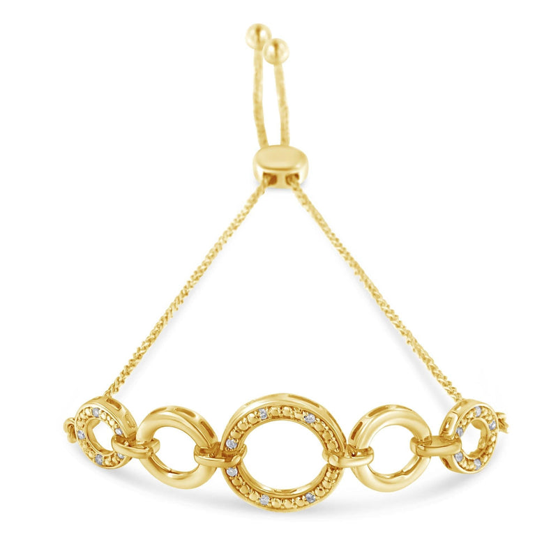 10K Yellow Gold over .925 Sterling Silver Diamond Accented Graduated Infinity Open Circle 6”-9” Adjustable Bolo Bracelet (H-I Color, I2-I3 Clarity) 10K yellow gold infinity bolo bracelet with graduated diamond accent circles