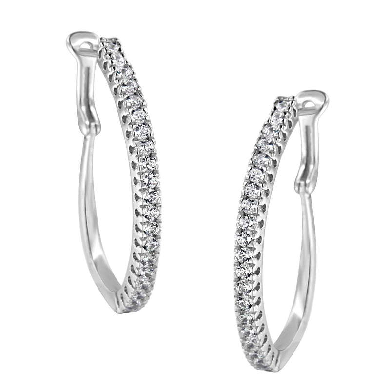10KT White Gold 1 cttw Diamond Hoop Earrings (I-J Clarity, I2-I3 Color) 10K white gold hoop earrings with round diamond stones along the front curve