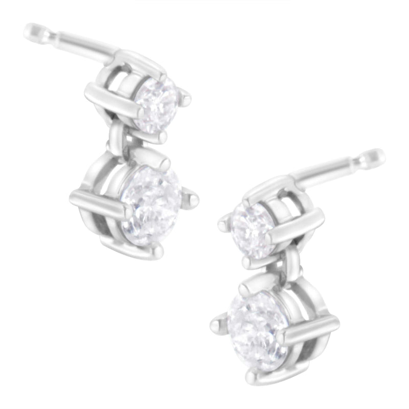 14K White Gold 1 cttw Double Diamond Stud Earrings (H-I Clarity, SI2-I1 Color) 14K white gold stud earrings with 2 round diamond stones