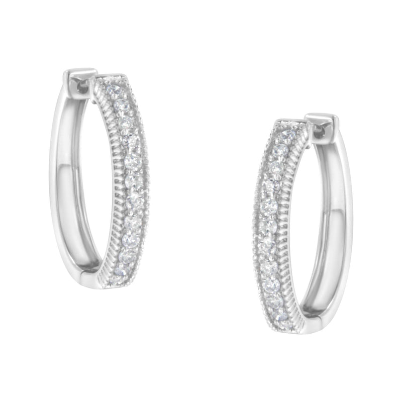 10KT White Gold Diamond Hoop Earring (1.00 cttw, H-I Color, I1-I2 Clarity) 10K white gold hoop earrings with channel-set round diamond stones