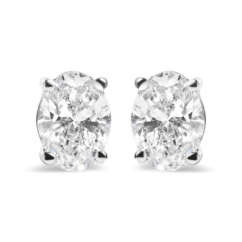 14K White Gold Prong Set Lab Grown Oval Diamond Solitaire Stud Earring (F-G Color, VS1-VS2 Clarity) 14K white gold ring with oval diamond in a prong setting