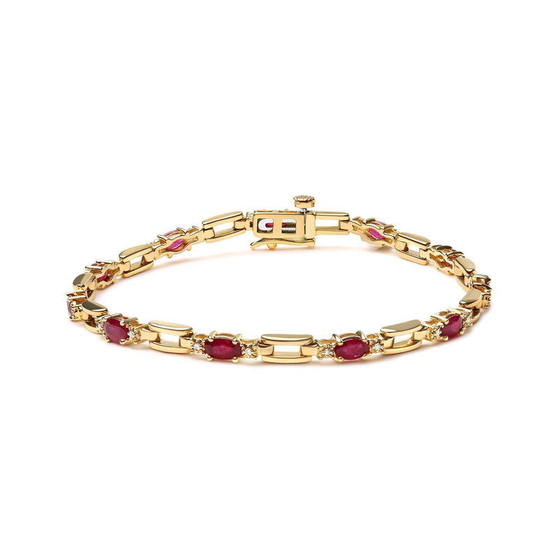 10K Yellow Gold Oval Ruby and 1/10 Cttw Diamond Bar Prong Set Bracelet (H-I Color, SI1-SI2 Clarity) - Size 7 10K yellow gold bracelet with oval ruby and round diamond stones