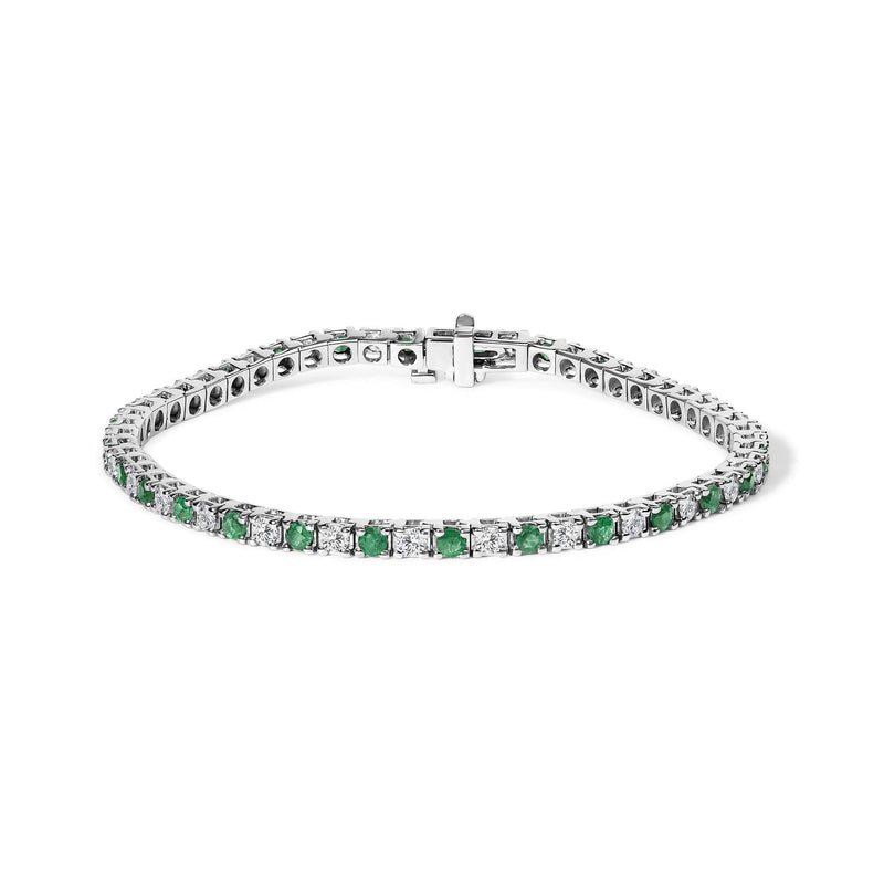 14K White Gold Alternating 1 1/2 Cttw Diamond and Emerald Tennis Bracelet 14K white gold bracelet with alternating round diamond and emerald stones