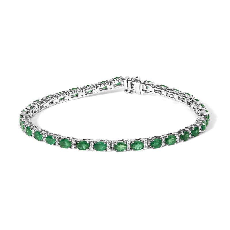 14K White Gold Alternating Oval Green Emerald and Diamond Tennis Bracelet 14K white gold bracelet with alternating oval emerald and diamond stones