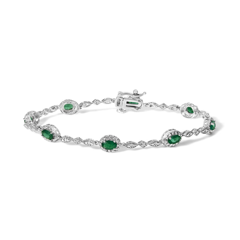 10K White Gold Oval Green Emerald & Diamond Alternating Link Bracelet 10K white gold bracelet with oval green emerald and diamond alternating stones