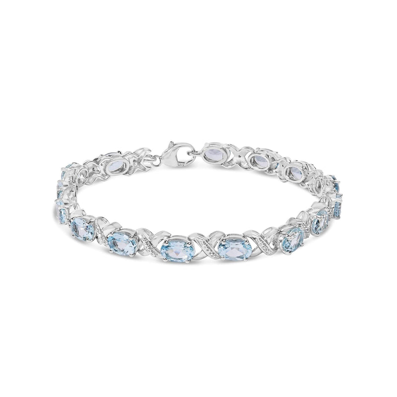 .925 Sterling Silver 16.0 Cttw Oval Blue Topaz and Diamond Accent Tennis X Link Bracelet (I-J Color, I1-I2 Clarity) - Size 7 925 sterling silver bracelet with oval blue topaz and diamond accent stones