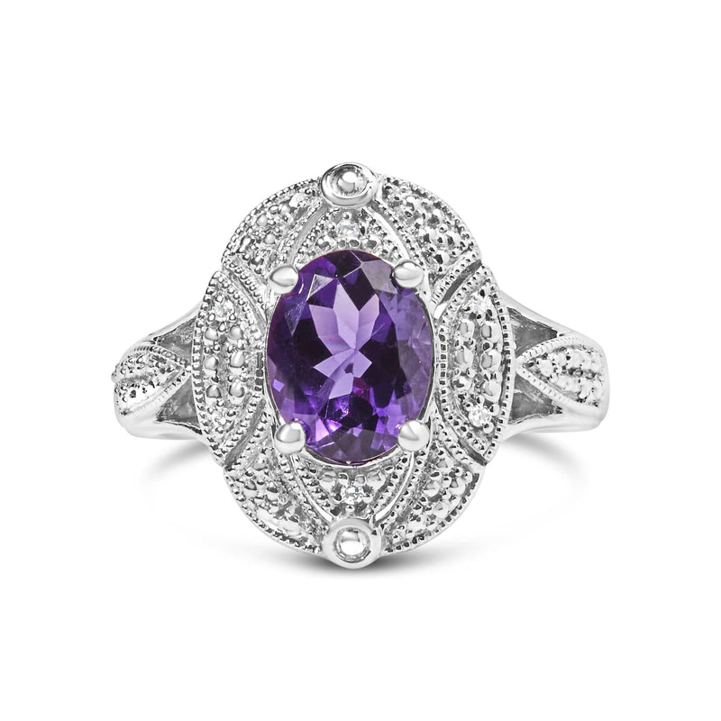 .925 Sterling Silver 9x7mm Oval Purple Amethyst and Round Diamond Accent Fashion Cocktail Ring (I-J Color, I1-I2 Clarity) 925 sterling silver ring with oval amethyst and round diamond accent stones