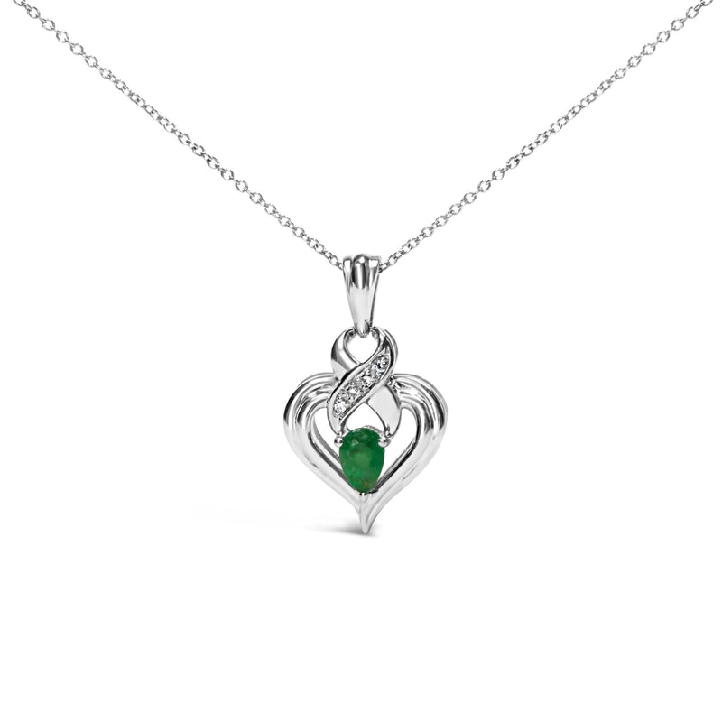 .925 Sterling Silver 6x4mm Pear Emerald and Diamond Accent Heart Pendant Necklace (H-I Color, SI1-SI2 Clarity) - 18 Inches 925 sterling silver heart necklace with pear emerald and diamond accent stones