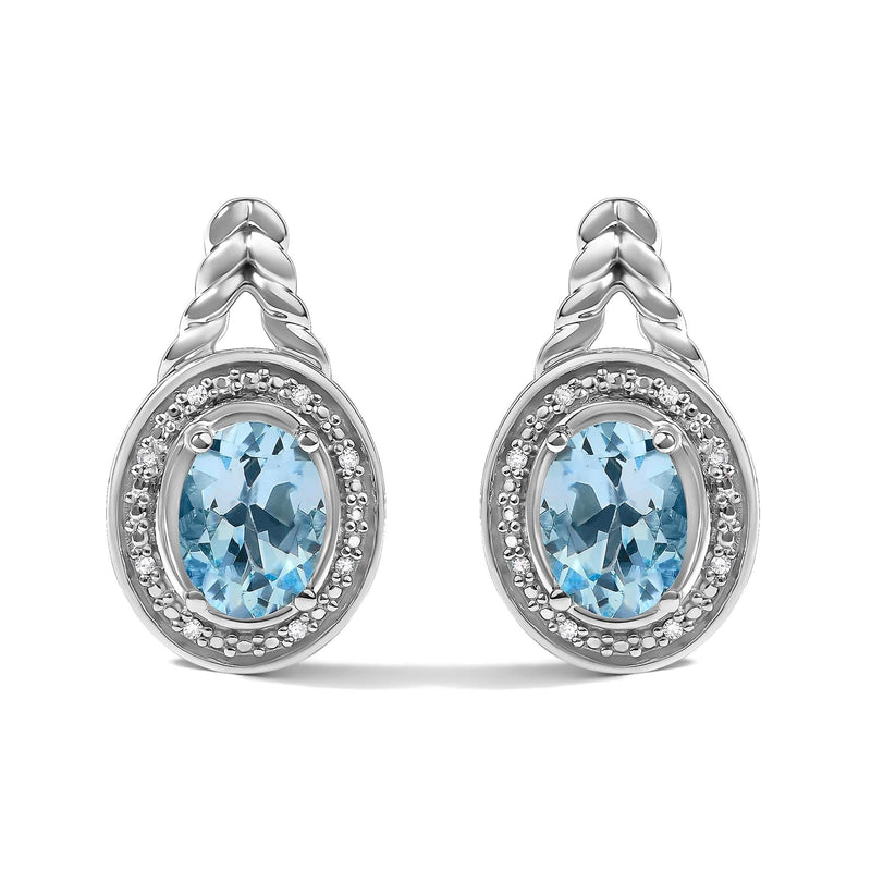 Sterling Silver Oval Blue Topaz and Diamond Accent Twist and Halo Drop Earrings 925 sterling silver drop earrings with oval blue topaz and diamond halo accents