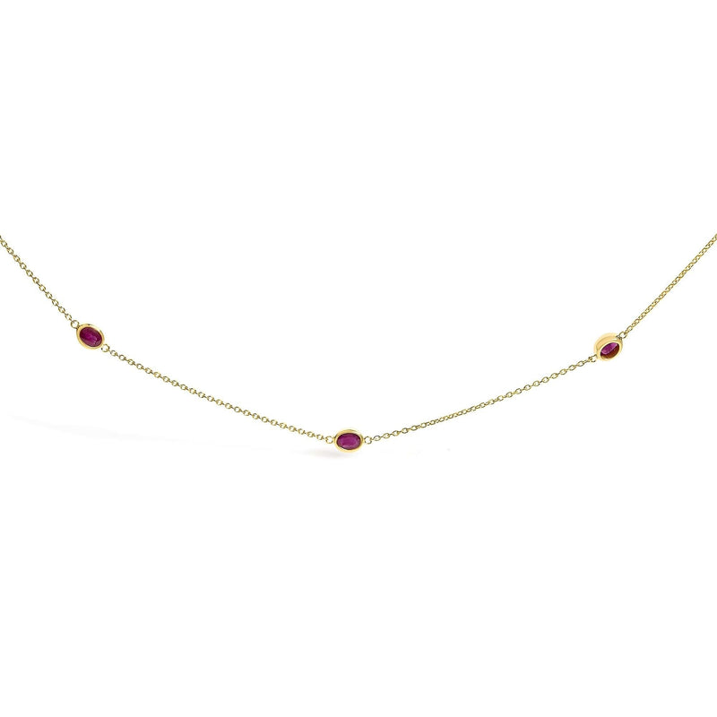 14K Yellow Gold Bezel Set 4x3 mm Oval Red Ruby Station Necklace - 18 Inches 14K yellow gold station necklace with oval ruby bezel-set stones