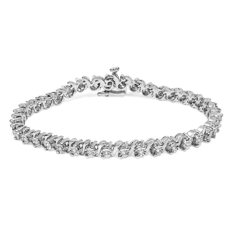 .925 Sterling Silver 1/4 Cttw Diamond Station and S Link Bracelet 925 sterling silver bracelet with diamond stations and S link chain