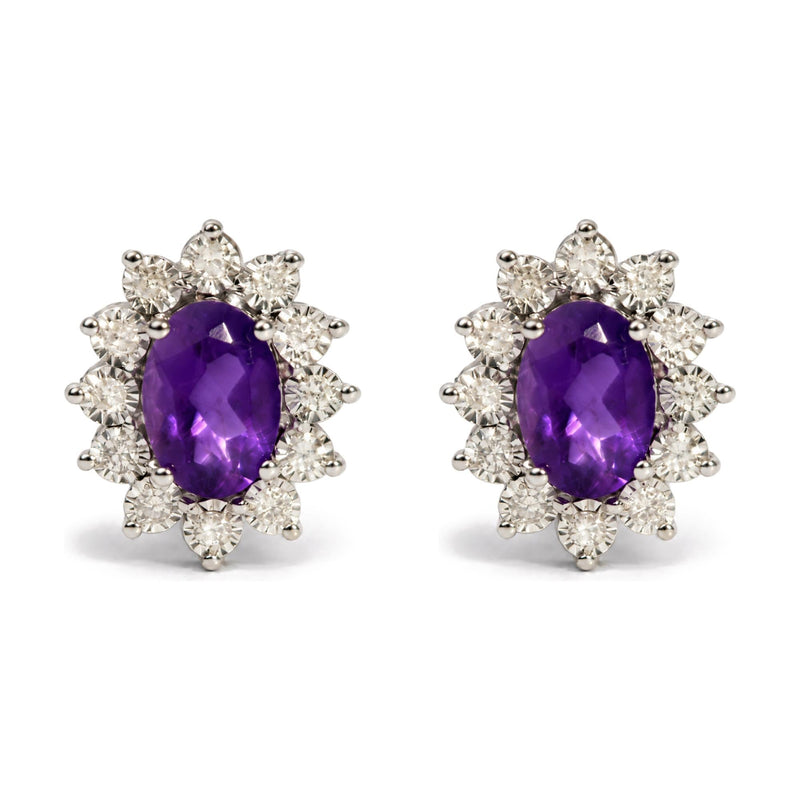 Sterling Silver 1/8 Cttw Diamond Starburst Oval Amethyst Stud Earrings