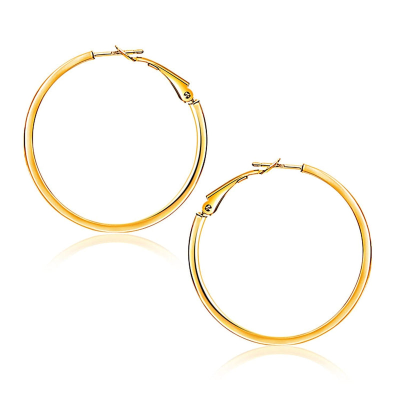 14K Yellow Gold Flat Hoop Earrings (1 1/4 inch Diameter) 14K yellow gold flat hoop earrings with 1 1/4 inch diameter, polished finish