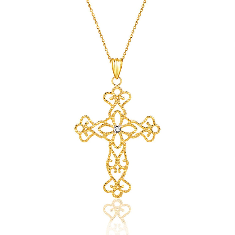 14K Yellow Gold Cross Pendant With Diamond 14K yellow gold cross pendant with a single round diamond stone