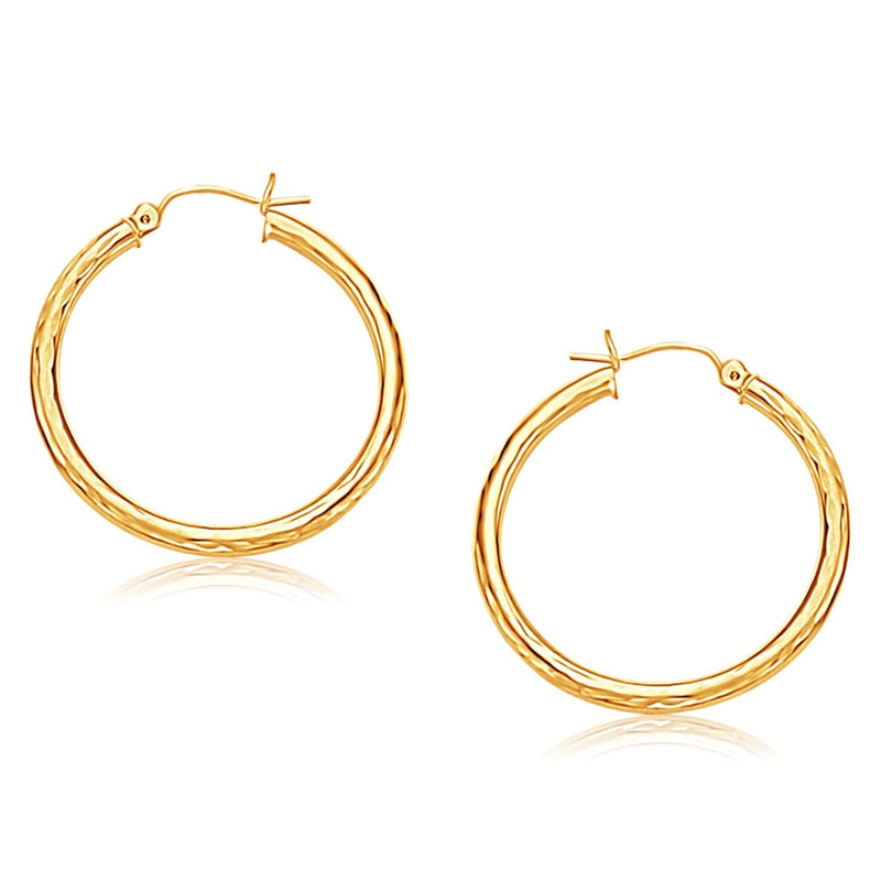 14k Yellow Gold Hoop Earring with Diamond-Cut Finish (3x30mm) 14K yellow gold hoop earring with diamond-cut faceted finish
