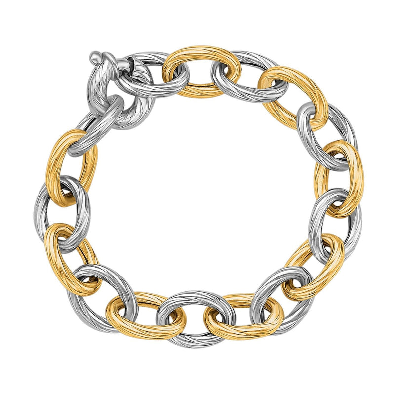 18k Yellow Gold and Sterling Silver Rhodium Plated Diamond Cut Chain Bracelet (9.65 mm) 18K yellow gold diamond-cut chain bracelet with April diamond birthstone accent