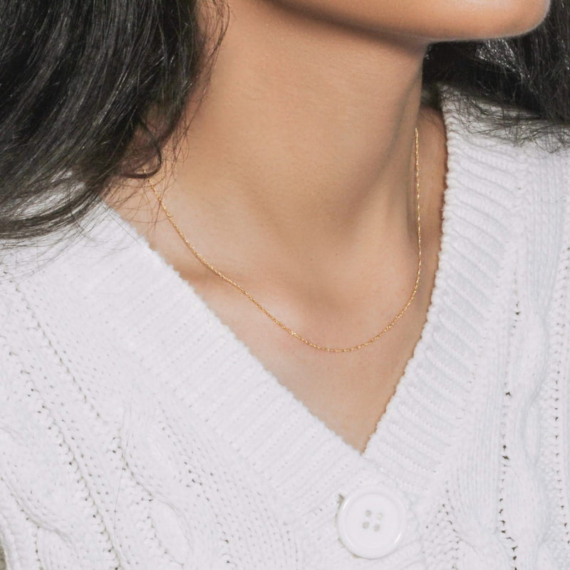 14k Yellow Gold Singapore Chain 0.81 mm 14K yellow gold Singapore chain with fine twisted spiral links