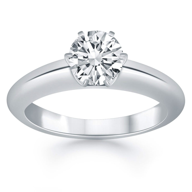 14k White Gold Solitaire Cathedral Engagement Ring 14K white gold solitaire cathedral engagement ring with raised center setting