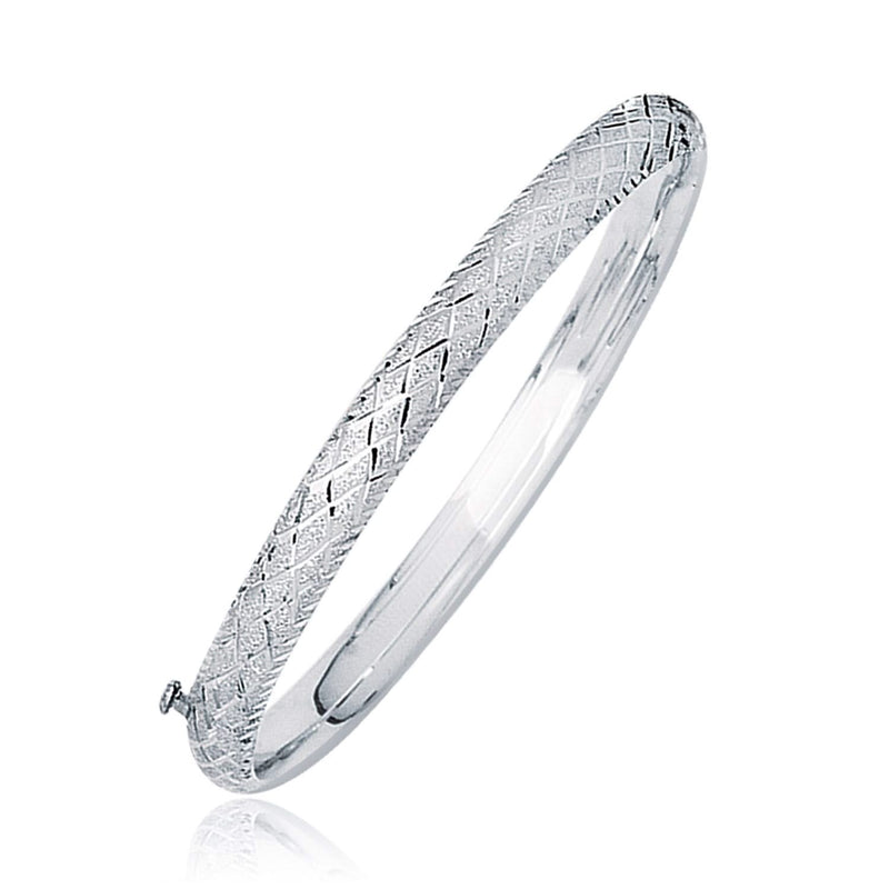 14k White Gold Weave Diamond Cut Dome Children's Bangle 14K white gold children's weave bangle with diamond-cut dome detailing