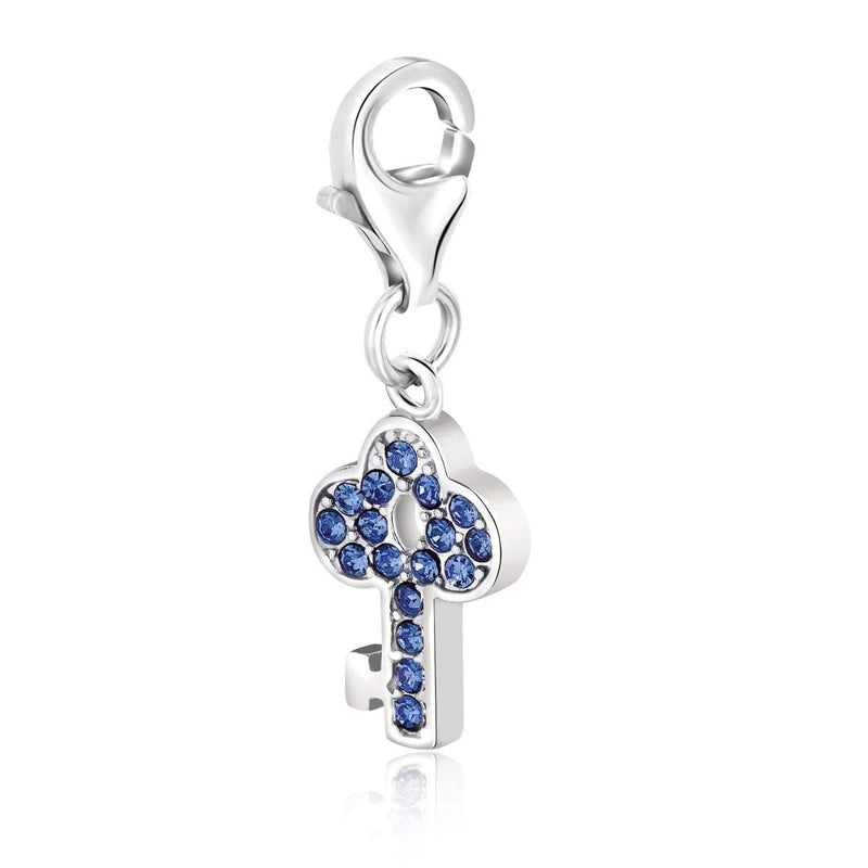 Sterling Silver Key Charm with Blue Tone Crystal Embellishments Sterling silver 925 key charm with blue-tone crystal accents