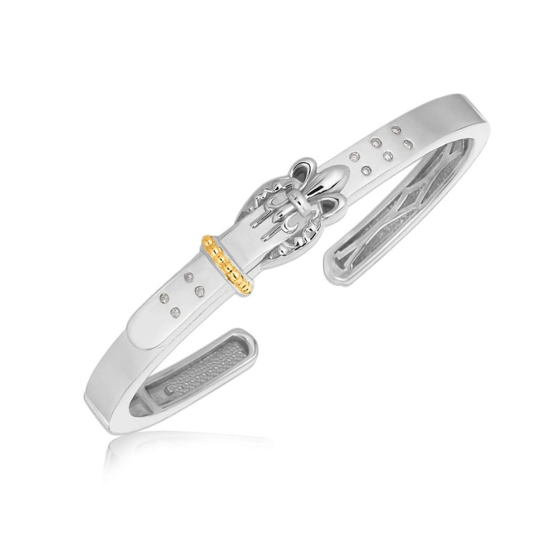 18K Yellow Gold and Sterling Silver Diamond Buckle Bangle (.15 ct. tw.) 18K yellow gold and silver buckle bangle with 15 round diamond stones