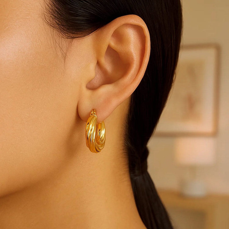 14k Yellow Gold Fancy Twist Hoop Earrings Product Image