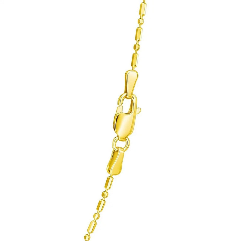 14k Yellow Gold Diamond-Cut Alternating Bead Chain (1.10 mm) 14K yellow gold beaded chain with alternating diamond-cut and polished links