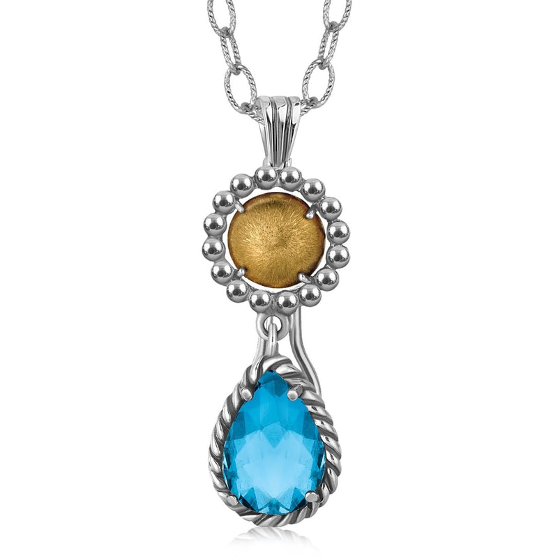 18K Yellow Gold and Sterling Silver Pendant with Teardrop Blue Topaz Accent 18K yellow gold and silver pendant with teardrop blue topaz stone