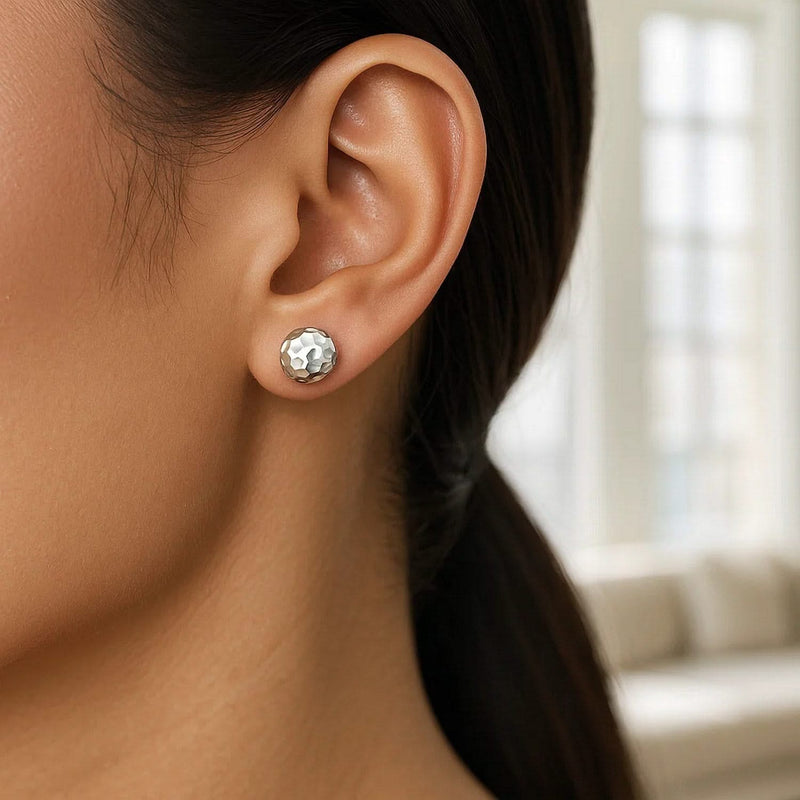 14k White Gold Round Faceted Style Stud Earrings(7mm) 14K white gold stud earrings with round faceted stones