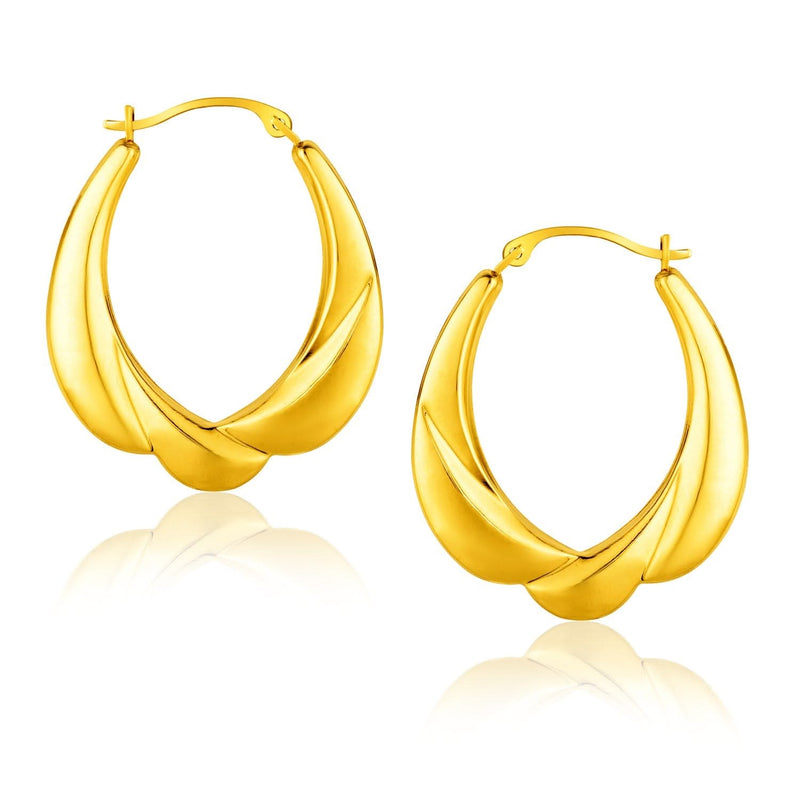 14K Yellow Gold Scallop Motif Graduated Oval Hoop Earrings 14K yellow gold hoop earrings with graduated oval scallop motif