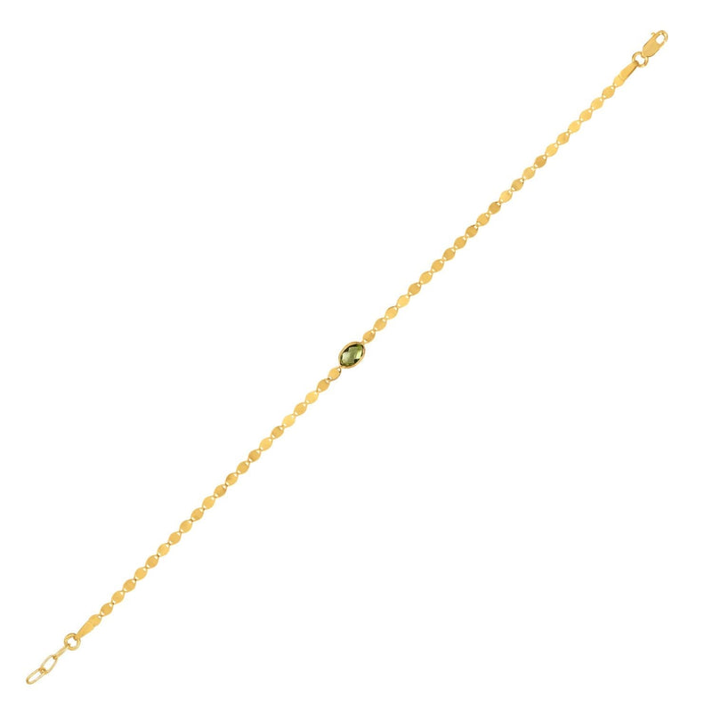 14K Yellow Gold Peridot Mirrored Chain Bracelet (2.20 mm) 14K yellow gold mirrored chain bracelet with peridot accent stone