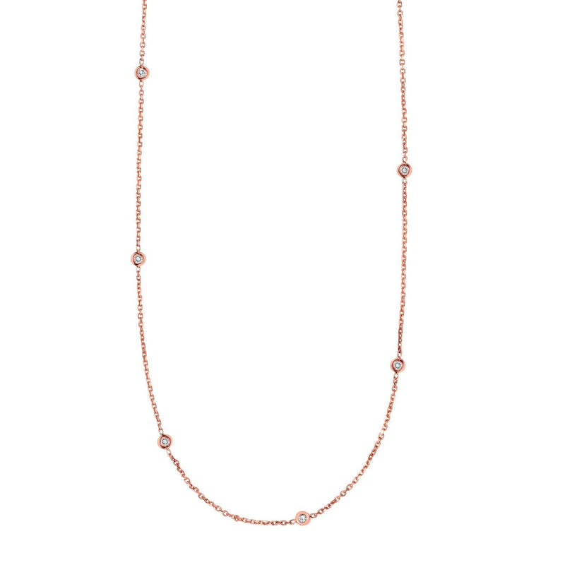 14K Rose Gold Diamonds by the Yard Necklace 14K rose gold diamonds by the yard necklace with spaced round diamond stations