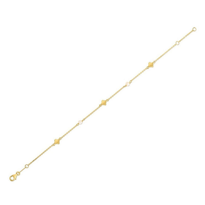 14k Yellow Gold Pearl Clover Bracelet 14K yellow gold clover bracelet with pear-shaped pearl stones