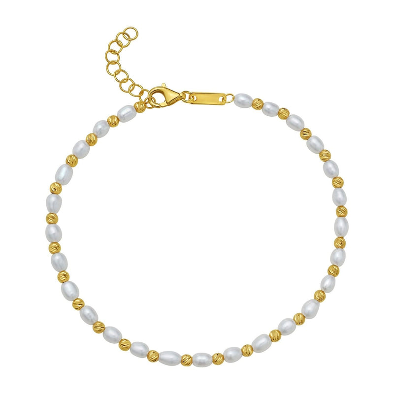 14K Yellow Gold Faceted Bead and Freshwater Pearl Bracelet (3.00 mm) 14K yellow gold bracelet with pear freshwater pearls and faceted gold beads
