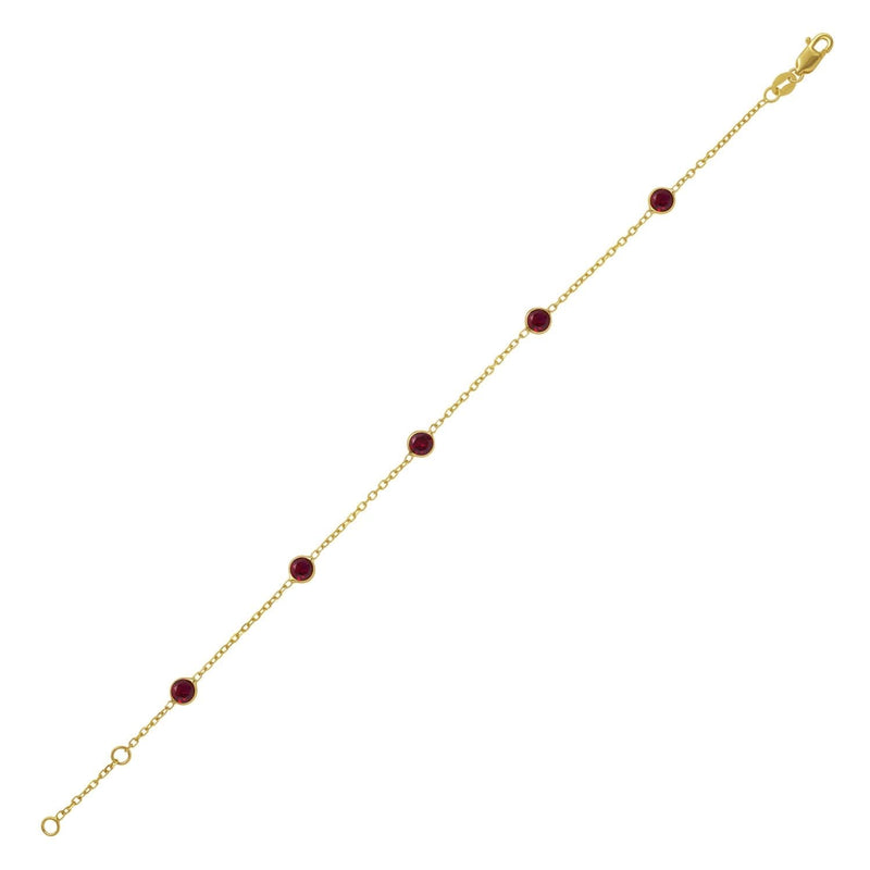 14K Yellow Gold Ruby Station Bracelet 14K yellow gold station bracelet with round ruby stones