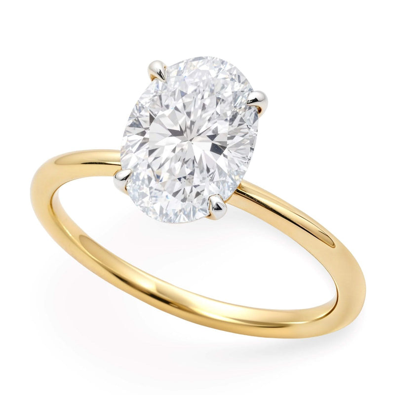 1 1/2 Carat Oval Lab Grown IGI G/VS1 Diamond Solitaire Ring in 14K Yellow Gold 14K yellow gold ring with 1 oval diamond stone in a solitaire setting