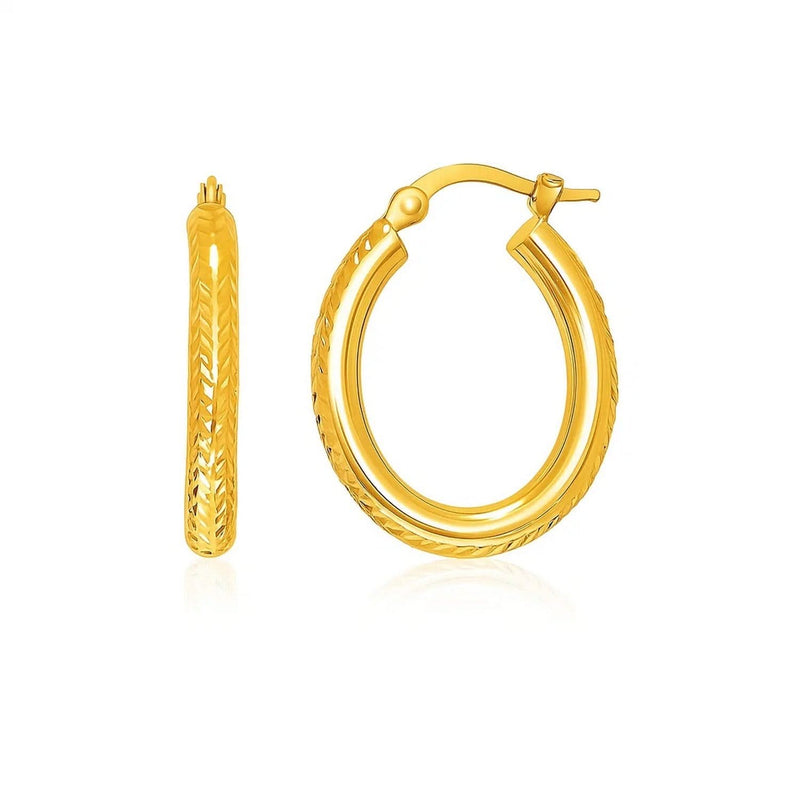 14k Yellow Gold Diamond Cut Textured Oval Hoop Earrings. 14K yellow gold hoop earrings with diamond-cut oval textured finish