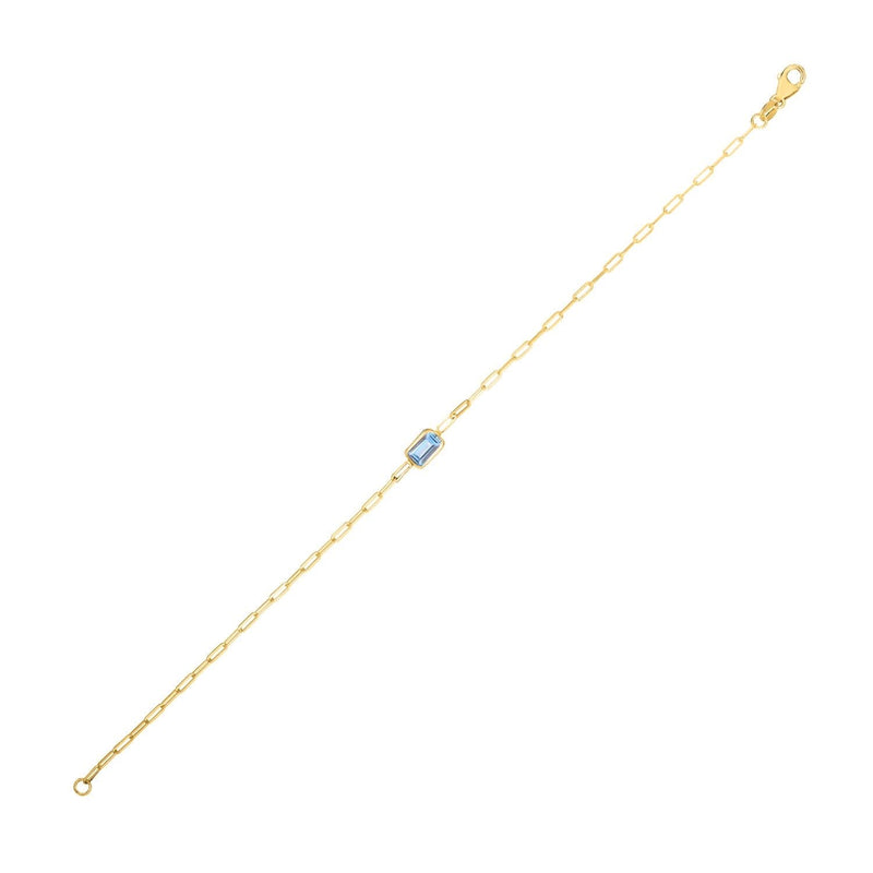 14K Yellow Gold Blue Topaz Paperclip Bracelet (1.50 mm) 14K yellow gold paperclip bracelet with blue topaz accent