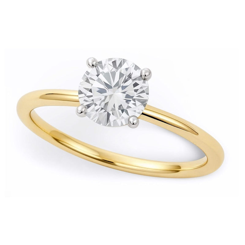 3/4 Carat Round Lab Grown IGI G/VS1 Diamond Solitaire Ring in 10K Yellow Gold 10K yellow gold ring with one round diamond in a solitaire setting