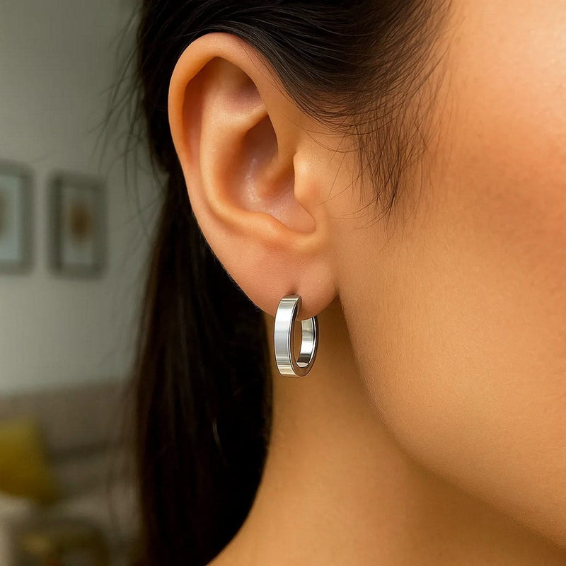 Sterling Silver Flat Style Oval Hoop Earrings with Rhodium Plating Product Image