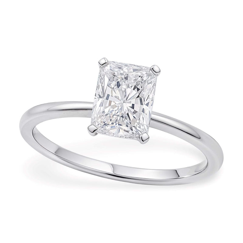 1 1/2 Carat Radiant Lab Grown IGI G/VS1 Diamond Solitaire Ring in 10K White Gold 10K white gold ring with one radiant lab grown diamond in a solitaire setting