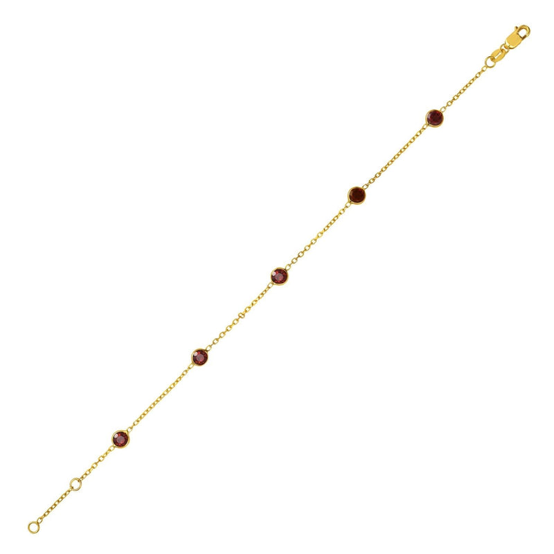 14K Yellow Gold Garnet Station Bracelet 14K yellow gold station bracelet with round garnet stones